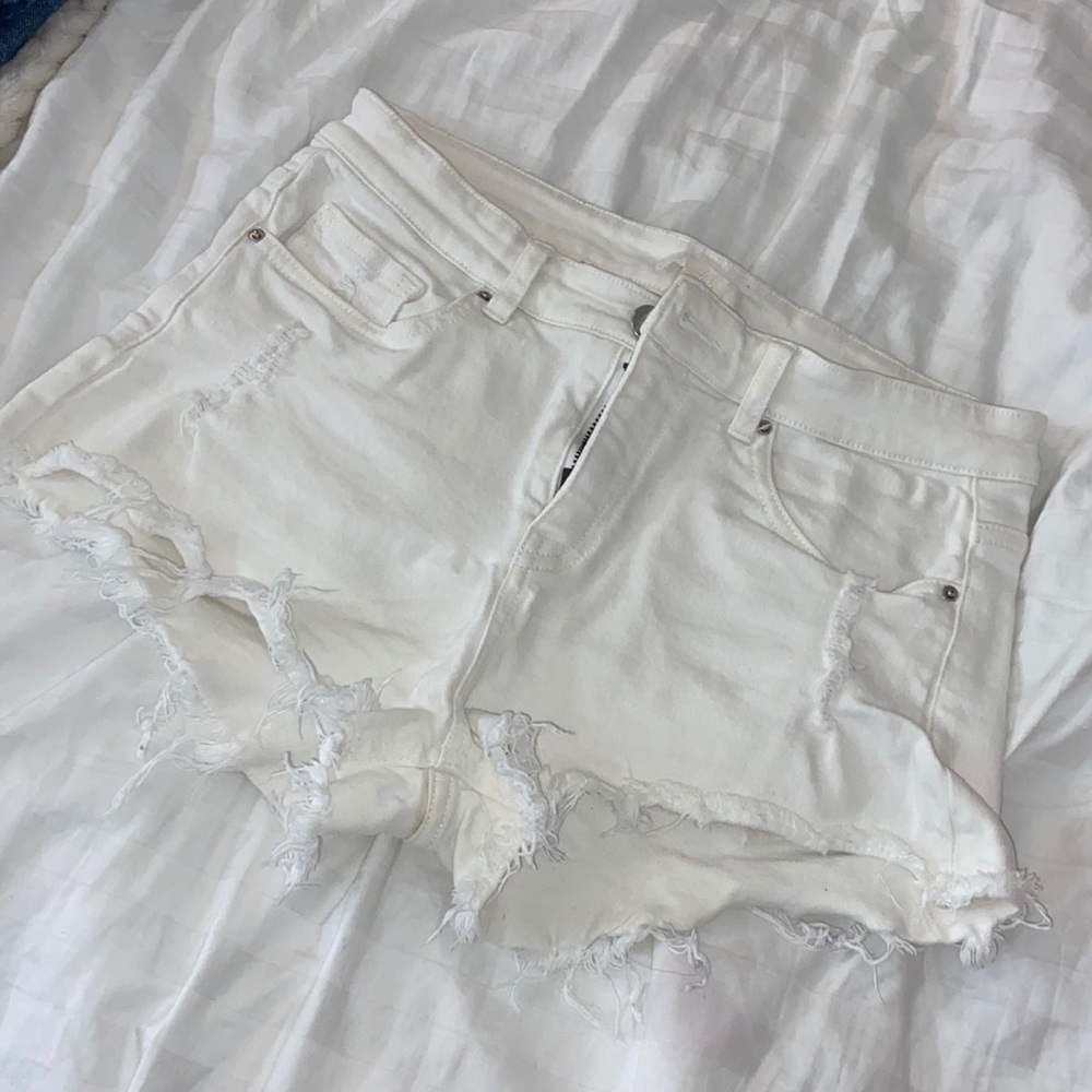White fringe shorts